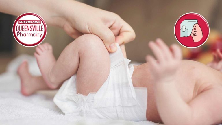 Image of infant laying on back, wearing a diaper.