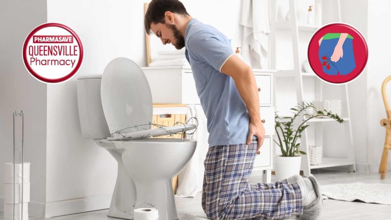 Man leaning over toilet with hand on left buttocks.